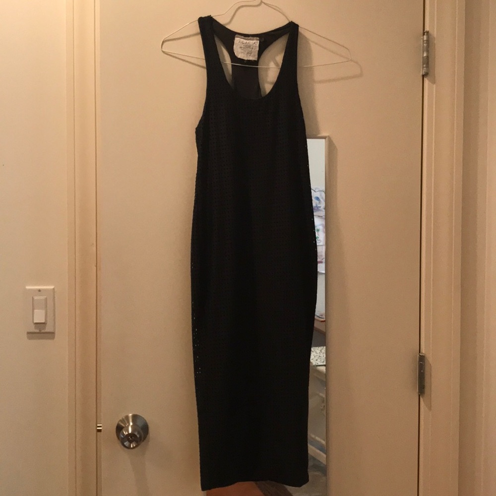 Form fitting dress with die cut holes (not sheer)